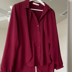 Red draped dress shirt with high low look